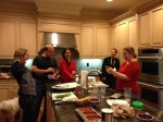 Photo of Zuckerberg family around kitchen island